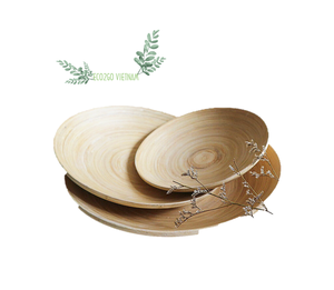 Ensemble d'assiettes filées naturelles en bambou faites à la main et durables avec logo laser rond en PC pour les fêtes Pack de plats du Vietnam - Product Image 1