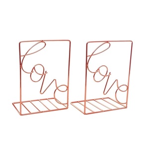 Serre-livres en or rose brillant au design moderne Serre-livres classiques en métal de luxe faits à la main pour la maison Variétés pour le rangement des livres - Product Image 2