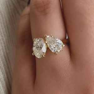 แหวนเพชรทรงรีและทรงหยดน้ำเพาะเลี้ยงในห้องปฏิบัติการ ดีไซน์ Toi et Moi คุณภาพพรีเมียม ทองคำแท้ 14K สำหรับขอแต่งงาน ของขวัญสำหรับคู่รัก - Product Image 1