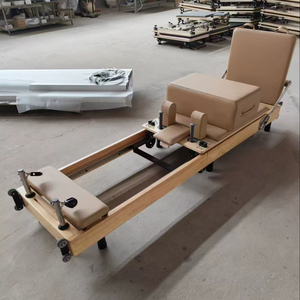 Reformer de Pilates de madera de roble duradera, plegable, rosa, con 6 resortes, plataforma de salto con asiento y almacenamiento, para entrenamiento de equilibrio vertical y fortalecimiento del core. - Product Image 1