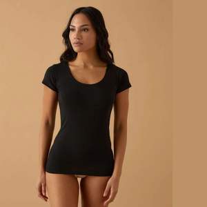 Camiseta de manga corta con cuello redondo para mujer, algodón elástico, suave y transpirable, ajuste cómodo Jadea - Product Image 4