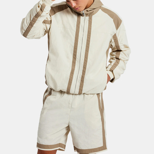 ชุดเซ็ตฤดูหนาวคุณภาพดีไซส์ใหญ่ ผลิตจากไนลอนรักษ์โลก แบบสั้น ซิปยาวเต็มตัว สองชิ้น ชุดกันลม สีตัดต่อ กลับด้านได้ พร้อมโลโก้ของคุณเอง - Product Image 5