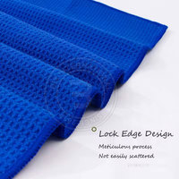 Serviette de golf gaufrée pour une gestion avancée de l'humidité, pour garder les mains sèches et les grips adhérents pendant les tours