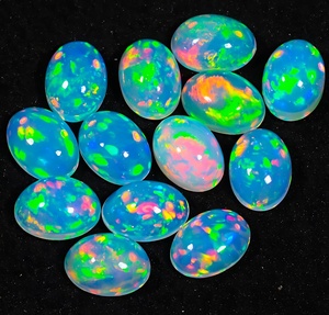 อัญมณีโอปอลทรงหลังเบี้ยโอปอลอัญมณีทรงวงรีหินโอปอลอัญมณีสีรุ้งแบบหลวมเรียบเรียบสีขายส่ง - Product Image 5