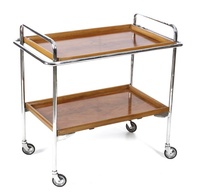 Chariot de service en métal de finition antique avec un look élégant, parfait pour les décorations de mariage et les dîners spéciaux