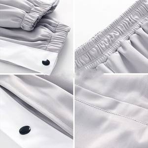 กางเกงบาสเก็ตบอลผู้ชาย ระบายอากาศได้ดี ผ้าโพลีเอสเตอร์ 100% ชุดกีฬา ทรงหลวม สไตล์จ็อกเกอร์ - Product Image 4