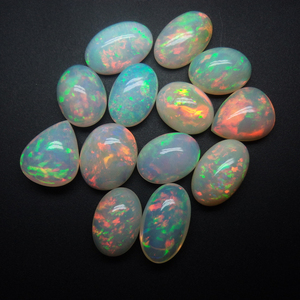 พลอยโอปอลสีขาวจากเอธิโอเปียธรรมชาติทรงวงรีเรียบอัญมณีหลวมสำหรับทำเครื่องประดับร้านค้าออนไลน์ - Product Image 1