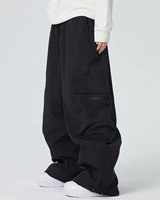Pantalon de ski d'extérieur d'hiver Vêtements de ski chauds pour femmes Pantalons de neige pour femmes Vêtements de snowboard amples Combinaison imperméable et coupe-vent pour hommes