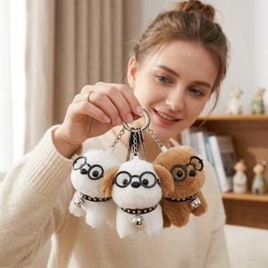 Aika Venta al por mayor de juguetes variados económicos de cachorros y bebés con gafas, llaveros personalizados y premios para máquinas de garras - Product Image 1