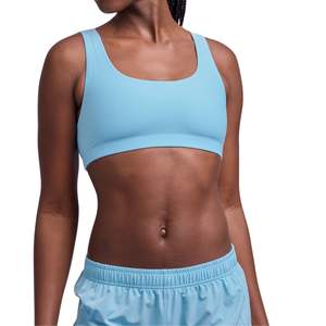 Soutien-gorge de sport sans couture réglable en gros personnalisé, couleur unie, séchage rapide, anti-choc, pour le yoga et l'entraînement en salle de sport - Product Image 1