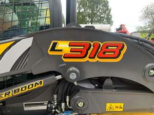 Calidad para cargadora de dirección deslizante diésel L318 con movimiento de oruga y alta eficiencia - Product Image 2