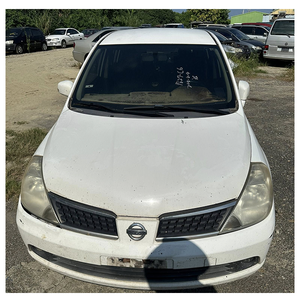 Nissan Sedán 2009 Blanco Automático Gasolina 5 Plazas Faros Halógenos Neumáticos R16 Volante a la Izquierda Emisión Euro IV - Product Image 1