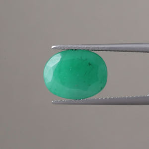 Émeraude synthétique certifiée IGI, vente en gros, pierre libre, 7,13 carats, taille ovale, 14x11 mm, 6 mm, vert premium, traitée thermiquement, phosphorescente - Product Image 1