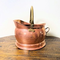 Seau de charbon de cuivre fabriqué artisanalement nouvelle arrivée avec des détails gravés et une large bouche adaptée au stockage des bûches et au style antique