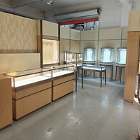 Vitrine de luxe en aluminium et verre pour téléphones portables, bijoux, cigarettes, montres, présentoir à bijoux avec éclairage LED