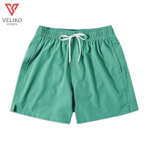 กางเกงเล่นกระดานโต้คลื่นทำจากผ้าใบสำหรับผู้ชายกางเกงขาสั้นกันยับวัสดุสแปนเด็กซ์เอวกลางฤดูร้อน - Product Image 1
