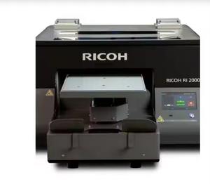เครื่องพิมพ์ DTG ไฮบริดสิ่งทอสิ่งทอสิ่งทอ Ri2000 RIC-OH ใหม่ล่าสุด-พร้อมส่ง - Product Image 2
