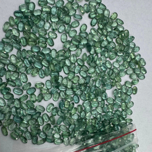 พลอยคิยาไนต์ธรรมชาติ TASBIYA GEMS ทรงรีขนาด 5x7 มม. เจียระไนเหลี่ยม พร้อมใบรับรองจากผู้เชี่ยวชาญ  เปลี่ยนสีได้ สำหรับขายส่ง - Product Image 2