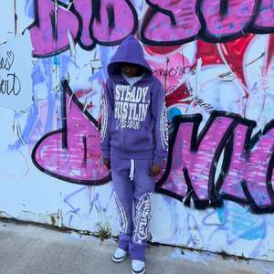 Fabricante de Conjuntos Deportivos Personalizados para Hombre con Diseño de Cremallera Estampada y Sudadera Holgada Unisex Estilo Baggy - Product Image 1