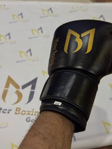 นวมชกมวยหนังแท้ทนทานสำหรับผู้ใหญ่ดีไซน์ตามสั่งเหมาะสำหรับใส่ซ้อมฝึกซ้อมยิม - Product Image 4