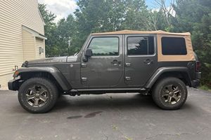 สภาพดีเยี่ยม รถจี๊ป แรงเลอร์ อันลิมิเต็ด โกลเด้น อีเกิล 4x4 ปี 2018 มือสอง - Product Image 2