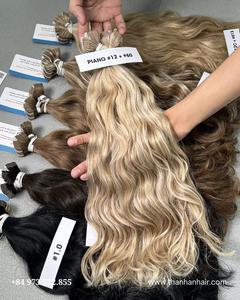 Extensions de cheveux vietnamiens 100% naturels, qualité supérieure, sans nœuds, très soyeux, prix usine, diverses couleurs, lisses et ondulés. - Product Image 3