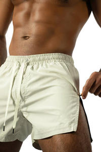 Pantalones cortos cómodos para correr para hombre, transpirables, con cremallera lateral, de secado rápido y ajustados, color sólido - Product Image 5