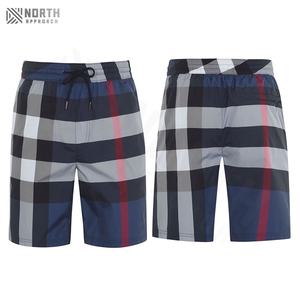 Shorts de sport décontractés pour hommes, vêtements de sport d'été, séchage rapide, coton, maille, couleur unie, taille élastique, shorts de sport coupe-vent, imperméables - Product Image 1