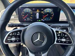 SUV USADO DE ULTRA LUJO 2024 C-200 299HP 4.0L TRANSMISIÓN AUTOMÁTICA DE 9 VELOCIDADES NEUMÁTICOS R18 IZQUIERDO INTERIOR DE TELA COLOR ELÉCTRICO OSCURO COPILOT 7 PLAZAS - Product Image 4