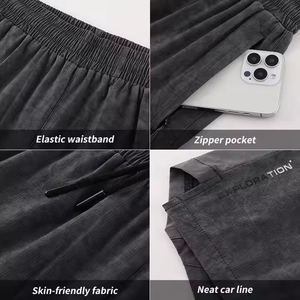 Bermudas décontracté à cinq paires pour hommes, en toile à séchage rapide, à taille élastique, à motif solide pour le fitness, la course à pied et l'extérieur. - Product Image 2