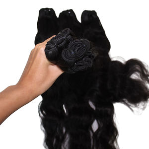 Nuestros mechones de cabello indio natural ondulado ofrecen un volumen lujoso, calidad duradera y textura natural para una belleza diaria impresionante - Product Image 1