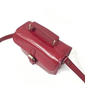 Sac à main élégant en cuir véritable bordeaux avec poignée supérieure et bandoulière réglable pour un usage quotidien élégant Indonésie - Product Image 2