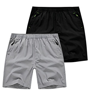 Shorts de bain pour homme à séchage rapide, taille élastique, couleur unie, décontractés, style Bermuda mi-long avec poches, gris et noir - Product Image 1