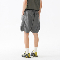 Unisexe été à la mode marque polyvalent multi-poches américain rétro Ins décontracté Shorts tricoté Six points lâche vêtements de travail