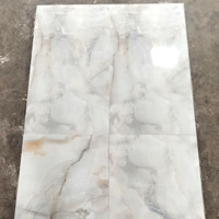 Carreaux en porcelaine émaillée polie de qualité supérieure 600x1200mm Carreaux de sol et de mur en dalle d'aspect pierre de marbre lisse et brillant