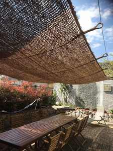 Voile d'ombrage rectangulaire en fibre de coco tressée écologique - Solution de refroidissement naturelle pour patios et balcons - Product Image 5