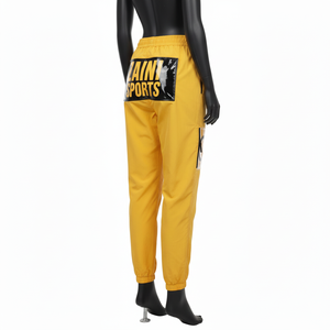 Pantalones Cortavientos de Nailon Premium para Mujer, Tela Transpirable de 120 GSM, Estilo Cargo con Paneles Amarillos, Logotipo Termosellado - Product Image 5