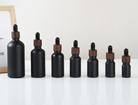 Vente en gros de flacons compte-gouttes en verre givré noir mat de 15 ml, 20 ml, 30 ml, 50 ml, 100 ml, 200 ml pour huiles essentielles et soins de la peau