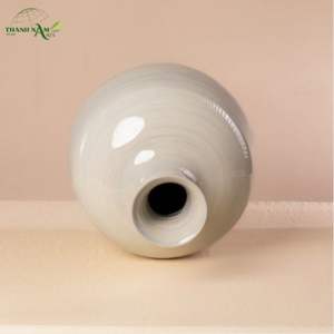 Jarrón Decorativo de Bambú Esculpido con Forma Enrollada, Material Natural Ecológico y Construcción Duradera - Product Image 4