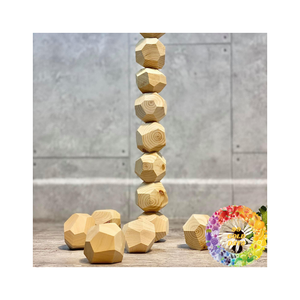 Juguete de roca de madera TUMI ISHI que fomenta la coordinación y la creatividad, ideal para programas de educación sensorial basados en Montessori - Product Image 1