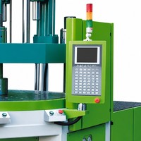 Machine de moulage par injection verticale bicolore HG-TW-120VR pour la production de couvercles de batterie, matériaux ABS/PC/PP/PE/PVC, haute précision