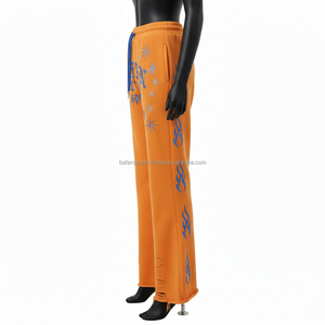 กางเกงขาบานผู้หญิง ผ้าฟลีซ 300GSM สีส้ม ยืดได้ พิมพ์โลโก้ตามสั่ง ลายพัฟฟ์ สไตล์ดิสเทรสสุดเทรนดี้ กางเกงขาบานผู้หญิง - Product Image 3