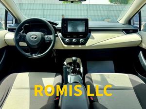 Toyota Corolla Usata 2020 Bianca, Berlina con Guida a Sinistra, Cambio Automatico, Fari LED R16, Tetto Apribile, Schermo Touch - Product Image 2