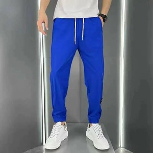 กางเกงกีฬาผ้าฝ้ายโพลีเอสเตอร์ขากว้างขาตรงลำลองมีเชือกผูกสำหรับกิจกรรมกลางแจ้งของผู้ชาย - Product Image 1