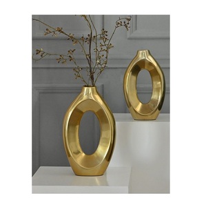 Florero de forma ovalada hecho a mano de metal decorativo de calidad superior para decoración del hogar y opciones de regalo - Product Image 1