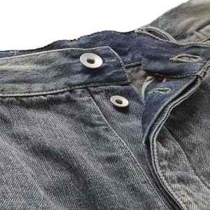 Jean slim moderne pour homme, couleur indigo intense, avec effet de délavage et texture brossée à la main, un essentiel de la mode masculine. - Product Image 5