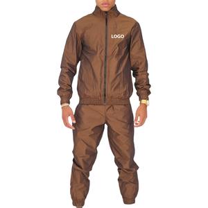 Survêtement de sport personnalisé en nylon léger avec fermeture éclair pour entraînement fitness, dernière conception, ensemble de jogging de gymnastique, ensemble de 2 pièces coupe-vent de couleur unie - Product Image 1