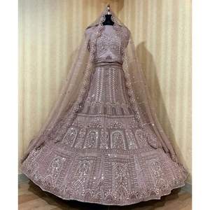 Conjunto de Lehenga nupcial Premium con intrincados patrones de lentejuelas bordadas y acentos Zari para exportación y pedidos a granel - Product Image 1