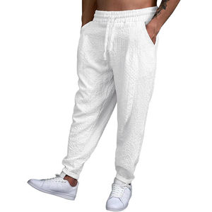 Pantalones de chándal informales ligeros de alta calidad para hombre para correr y trotar pantalones largos acampanados con estampado de calavera para entrenamiento deportivo - Product Image 2