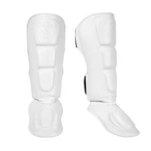 Espinilleras de Cuero Genuino Aura Stitch, Forjadas en Batalla, Equipo de Protección para MMA, Muay Thai y Kickboxing - Product Image 1